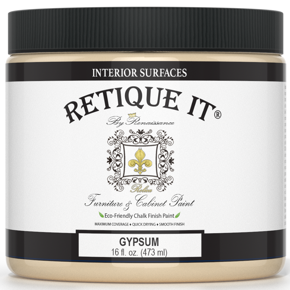 Retique It furniture and cabinet paint in a quart container, designed for gypsum surfaces, shown in a natural setting.