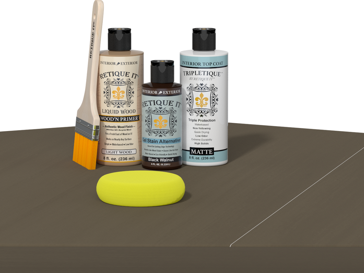 Retique It® Black Walnut kit with brush, Wood’n Primer, matte top coat, and yellow sponge on a wood surface.