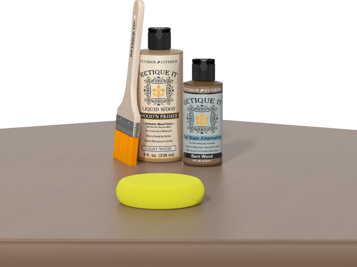 Retique It® Barn Wood Kit with Light Wood’n Primer, Barn Wood Gel Stain Alternative, paintbrush, and yellow sponge on a wood tabletop.
