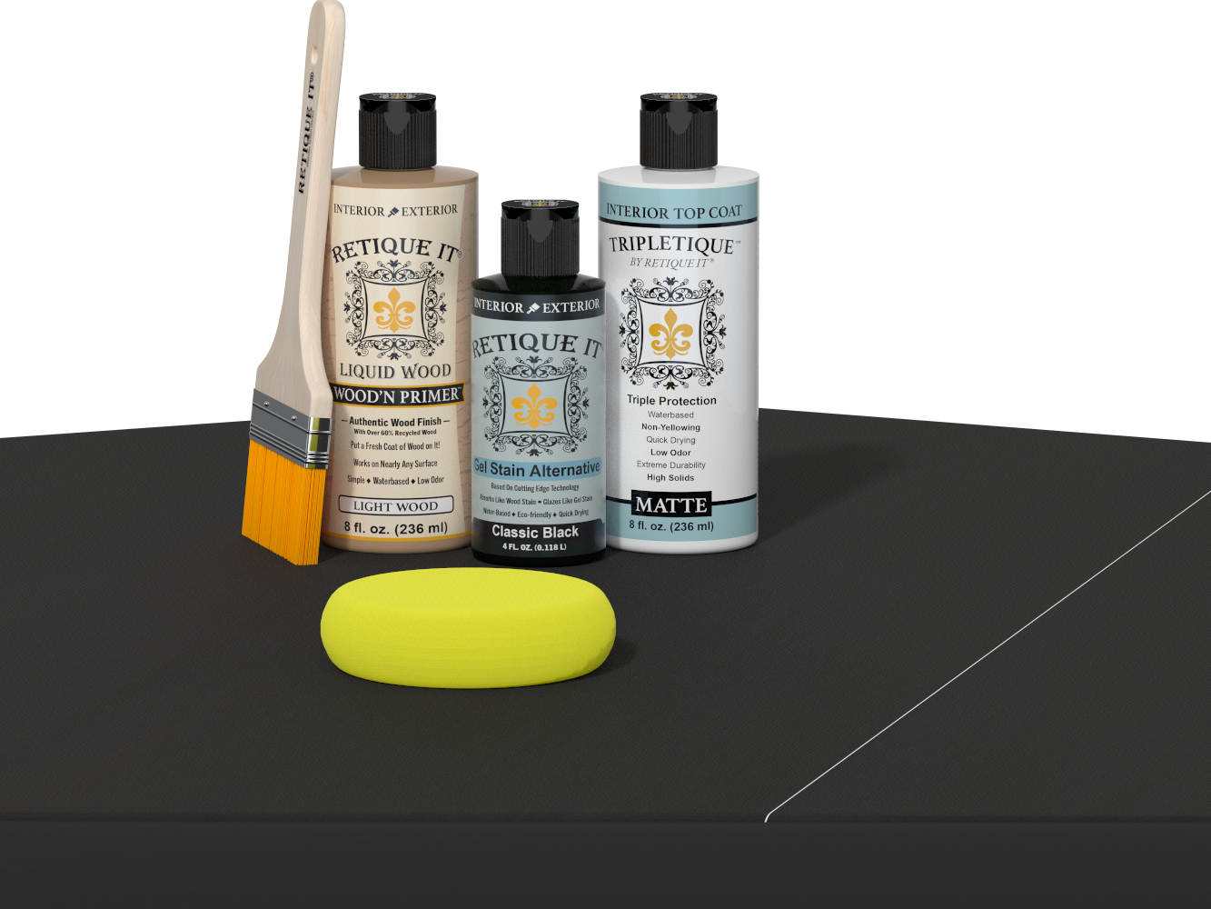 Retique It® Light Wood Wood’n Primer with Classic Black Gel Stain Alternative, matte topcoat, brush, and yellow sponge on a dark tabletop.