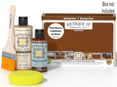 Retique It® Cherry Multipurpose Kit with box not included, primer, Cherry Gel Stain Alternative, brush, and yellow sponge on a brown tabletop.
