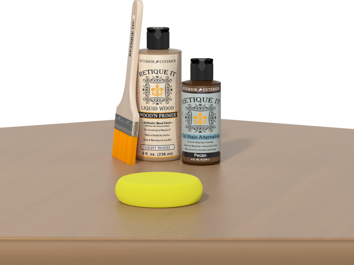 Retique It® Dark Pecan Kit with Light Wood’n Primer, Pecan Gel Stain Alternative, paintbrush, and yellow sponge on a wood tabletop.