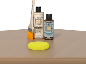 Retique It® Light Wood kit with brush, Wood’n Primer, Pecan stain alternative, and yellow sponge.