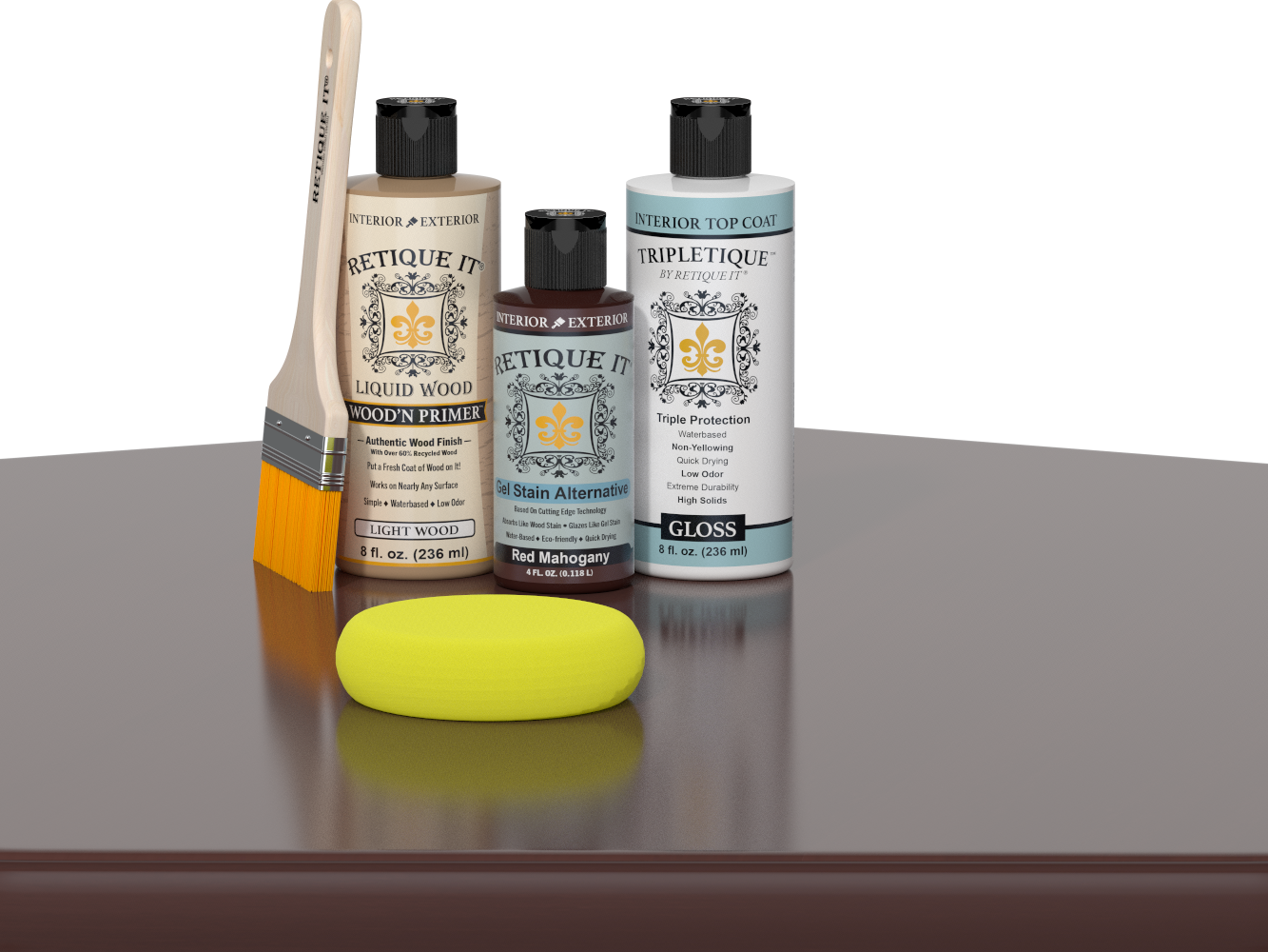 Retique It® Light Wood Wood’n Primer with Red Mahogany Gel Stain Alternative, gloss topcoat, brush, and yellow sponge on a reflective tabletop.