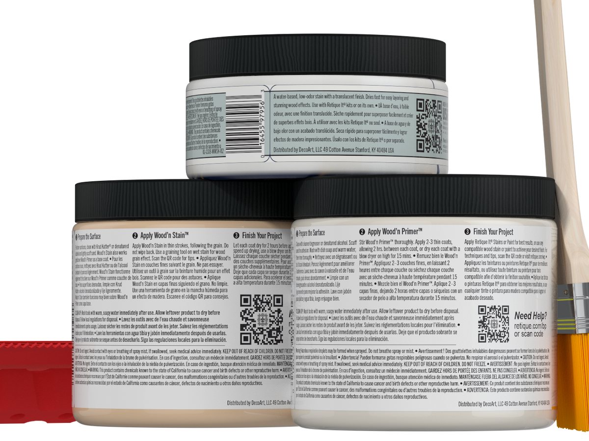 Sun-bleached Retique It® Wood'n Kit in medium size, showing wood finish application with brushes and wood samples.