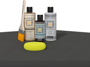 Retique It® multi-purpose charcoal exterior top coat wood finish kit with smooth finish, shown in a table setting.