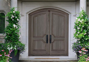 Retique It Wood'n Finish Kit in Harbor Gray with four large exterior top coat containers, displayed on a double front door.