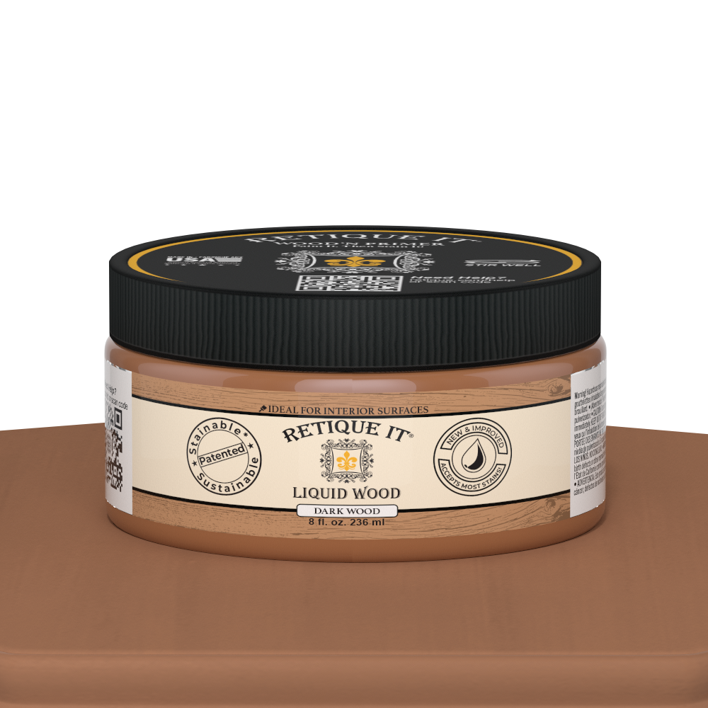 Dark liquid wood paint by Retique It® in an 8oz jar displayed on a table, ready for interior wood finishing projects.