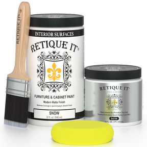 Retique It® Renaissance Furniture Paint in Snow, a smooth white paint applied to furniture surface, showcasing a clean, matte finish.