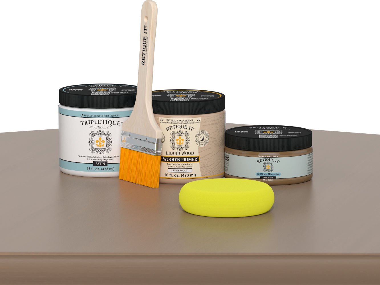 Retique It Barn Wood Kit with Satin Tripletique, Light Wood Wood'n Primer, Barn Wood Gel Stain Alternative, paintbrush, and yellow sponge on a tabletop.