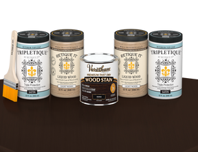 64 oz Retique It Liquid Wood kit with Kona stain, satin Tripletique topcoat, and a paintbrush on a matching finished tabletop.