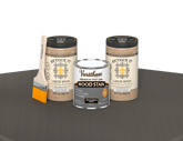 64 oz Retique It Liquid Wood kit with Varathane Weathered Gray stain and a paintbrush on a matching finished tabletop.