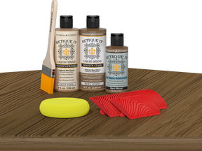 Retique It® Fireplace Mantel Wood'n Finish Kit in Barn Wood stain, showing the wood stain application on a mantel surface.