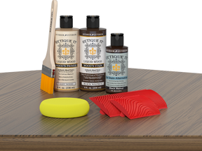 Retique It® Wood'n Finish Kit in Black Walnut stain showing wooden table surface with applied black walnut stain and finishing tools.