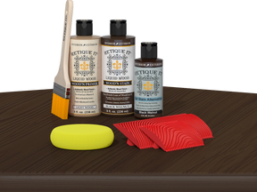 Retique It® Wood'n Finish Kit in Black Walnut stain displayed on a table, showcasing the wood stain product for fireplace mantels.