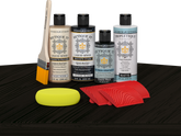Retique It® Wood'n Finish Kit in Classic Black stain shown on table surface for woodworking and furniture finishing.