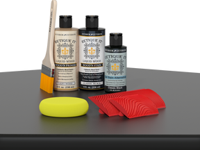 Retique It® Wood'n Finish Kit in Classic Black stain for tabletops, showing wood surface with black finish and applicator tools.