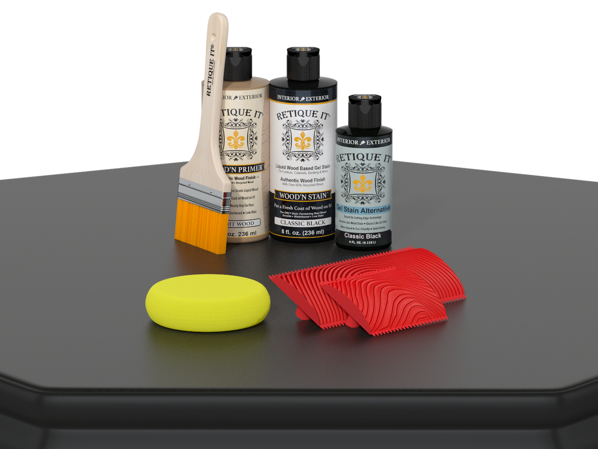 Set of paint-related products including bottles, a brush, and a sponge on a black surface with a white background.
