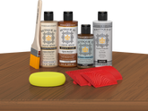 Retique It® Wood'n Finish Kit in cedar, a multi-purpose exterior top coat shown on a table for wood finishing projects.