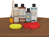 Retique It® Cedar Wood'n Kit with Matte TripleTique® includes a brush, Light Wood primer, Cedar stain, Pecan Gel Stain Alternative, Matte TripleTique® top coat, a yellow sponge, and a red graining tool.