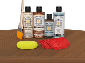 Retique It® Cedar Wood'n Kit with Matte TripleTique® includes a brush, Light Wood primer, Cedar stain, Pecan Gel Stain Alternative, Matte TripleTique® top coat, a yellow sponge, and a red graining tool.