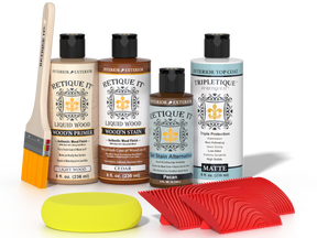Retique It® Cedar Wood'n Kit with Matte TripleTique® includes a brush, Light Wood primer, Cedar stain, Pecan Gel Stain Alternative, Matte TripleTique® top coat, a yellow sponge, and a red graining tool.