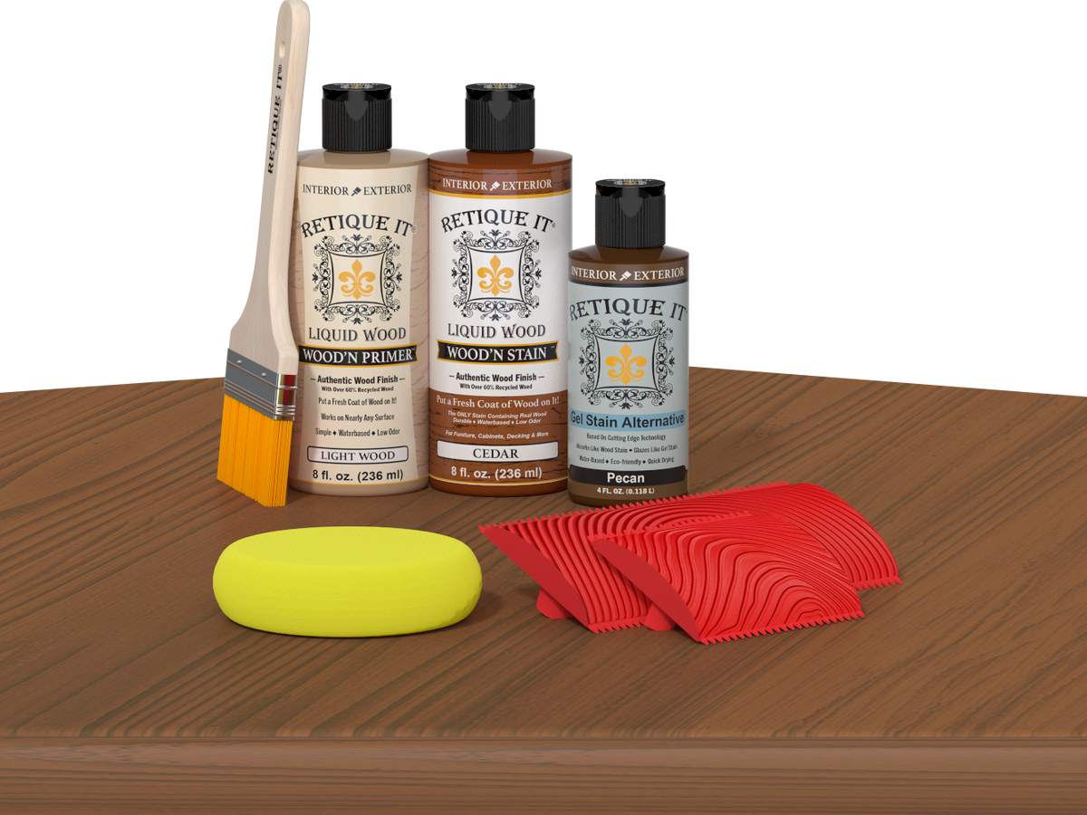 Retique It® Wood'n Kit cedar finish, multi-purpose wood finishing kit shown on table with applicator tools and wood sample.