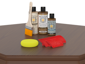 Wood care products including bottles, a brush, and cloths on a wooden surface.