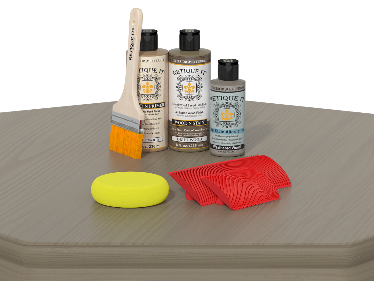Set of wood care products including bottles, a brush, and sponges on a gray surface.