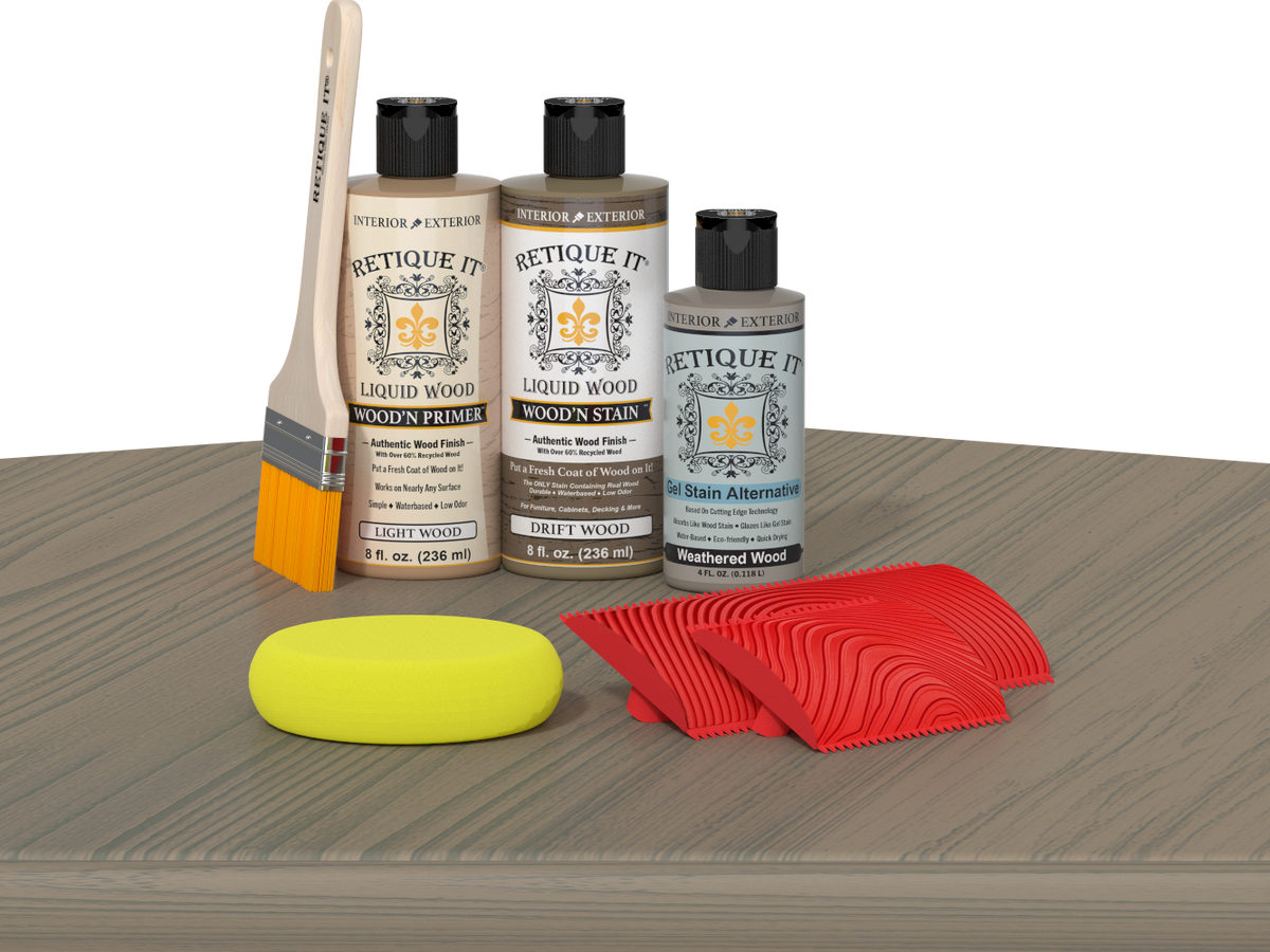 Retique It Fireplace Mantel Wood'n Finish Kit in Drift Wood stain, showing wood grain and application details on a table surface.