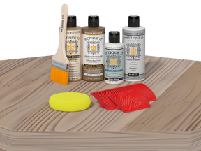 Wood care products including bottles, a brush, and applicators on a wooden surface.