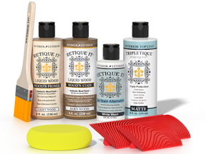 Retique It® French Oak Wood'n Kit with Light Wood primer, Barn Wood stain, White Wash gel stain alternative, Matte Tripletique® Top Coat, brush, red graining tool, and yellow sponge.