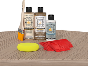 Retique It® Wood'n Finish Kit in French Oak, a multi-purpose wood finishing kit displayed on a table with wood samples.