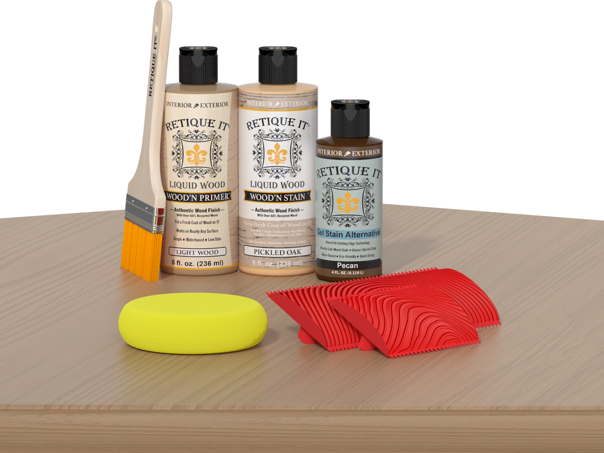 Retique It® Wood'n Finish Kit in Pickled Oak for tabletop staining, includes stain bottles and applicator tools, shown on a wooden surface.