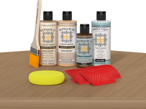 Retique It® Pickled Oak Wood'n Kit with Light Wood primer, Pickled Oak stain, Pecan gel stain alternative, Gloss Tripletique® Top Coat, brush, red graining tool, and yellow sponge.