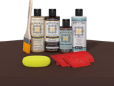 Retique It® Wood'n Finish Kit in Red Mahogany with interior top coat, showing wood surface and application tools for multi-purpose use.