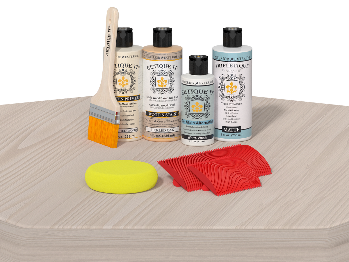Set of wood care products including bottles, a brush, and sponges on a wooden surface.