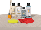 Retique It® Wood'n Finish Kit in Sun Bleached for interior wood projects, showing the top coat and application tools.