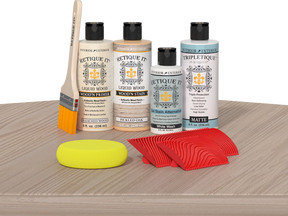 Retique It® Wood'n Finish Kit Sun Bleached tabletop with wood finish in a natural, sun-bleached tone, showing application on surface.