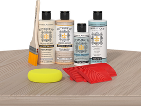 Retique It® Sun Bleached Wood'n Kit with Bleached Wood primer, Pickled Oak stain, White Wash gel stain alternative, Matte Tripletique® Top Coat, brush, red graining tool, and yellow sponge.