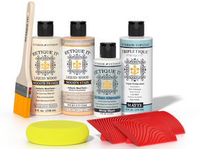 Retique It® Sun Bleached Wood'n Kit with Bleached Wood primer, Pickled Oak stain, White Wash gel stain alternative, Matte Tripletique® Top Coat, brush, red graining tool, and yellow sponge.