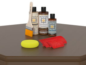 Retique It wood care products including bottles, a brush, and cloths on a brown surface.