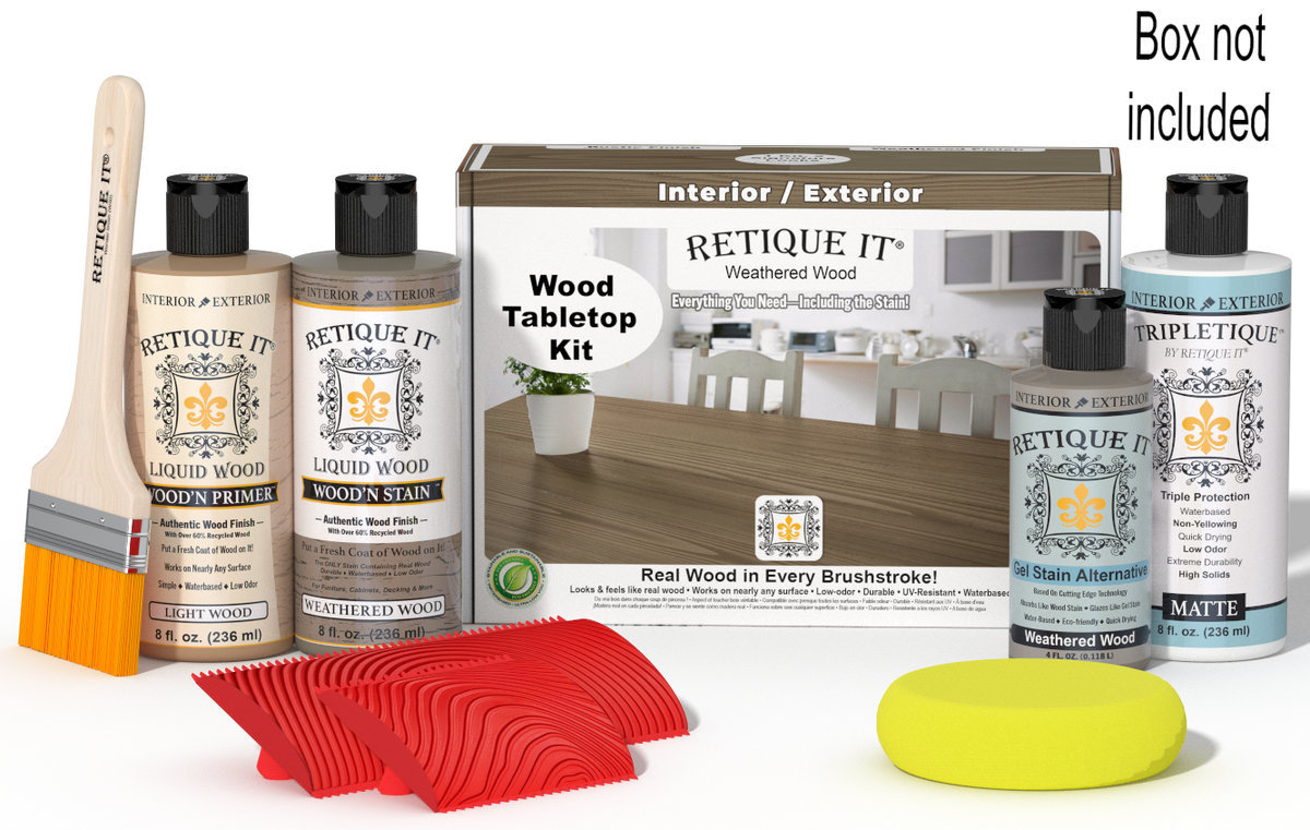 Retique It® Wood'n Finish Kit in Weathered Wood stain, featuring a box with stain bottles and application tools on a wooden surface.