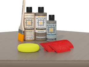 Retique It® Wood'n Finish Kit for weathered wood, showing stained wooden tabletop with a weathered, rustic finish.