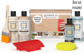 Retique It® White Oak Multipurpose Kit with Bleached Wood primer, Pickled Oak stain, Pecan gel stain alternative, Matte Tripletique® Top Coat, brush, red graining tool, yellow sponge, and product box.