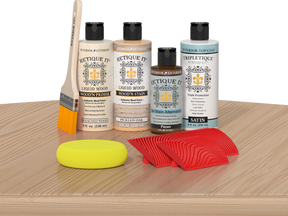 Retique It® White Oak Wood'n Kit with Bleached Wood primer, Pickled Oak stain, Pecan gel stain alternative, Satin Tripletique® Top Coat, brush, red graining tool, and yellow sponge.