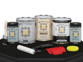 Retique It® Wood'n Finish Kit in Classic Black with four large exterior top coats, matte finish, shown on a wooden table.
