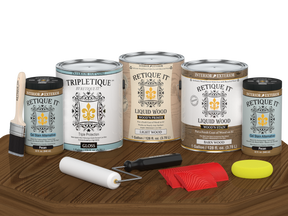 Retique It® Modern Walnut Wood Kit with gallon primer, stain, gloss topcoat, gel stains, brush, roller, yellow sponge, and red graining tools.