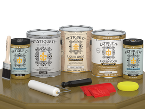 Retique It® Wood'n Finish Kit in Old Oak, 4-piece exterior top coat set for wood surfaces, glossy finish on a table.