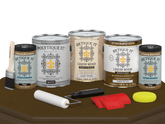 Retique It® Wood'n Finish Kit in Dark Pecan with four large containers and applicator tools for exterior wood finishing.